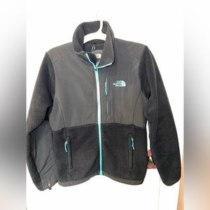 Black Fleece North-face Denali zip up jacket with teal blue trim.